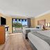 Travelodge by Wyndham San Clemente Beach guest room with two beds and balcony ocean view