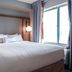 Fairfield Inn & Suites by Marriott Indianapolis Noblesville guest room with king bed and window view