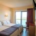 htop Molinos Park hotel room in Salou with twin beds, balcony door and sea view