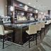Holiday Inn & Suites Red Deer South by IHG bar and lounge with counter seating and booths