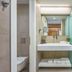 Mystery Skiathos Luxury Residence bathroom with vanity, shower, toilet and towel rack
