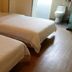 7 Days Inn Guangzhou Zoo Metro Station Branch twin room with two beds and bathroom view