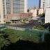 Zhiyuanlou Hotel in Qingdao with city views and tennis courts beside the building
