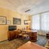 Galerie Hotel Leipziger Hof in Leipzig room with desk, dining table, armchair and large windows