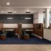 Courtyard by Marriott Cleveland Beachwood lounge with private booth seating and pendant lights