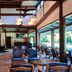Towada Prince Hotel in Kosaka lounge with blue seating, high wood beam ceiling and large windows