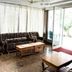 Hotel Sunil Krishna in Tirupati lobby with plush sofas, coffee tables and glass entrance
