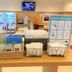 Toyoko Inn Izumo-shi Ekimae lobby counter with rental items and pamphlets in Izumo