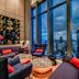 Capri by Fraser, Bukit Bintang lounge with city skyline views in Kuala Lumpur