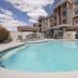 Holiday Inn Express & Suites Las Vegas Sw Springvalley By IHG pool and patio with lounge chairs