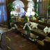 Park Plaza Hotel in Winter Park lobby with leather sofa, armchairs, large mirrors, arched windows and lamps