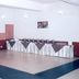 Himgiri Resorts in Dharamshala banquet hall with long catered table and open dance floor