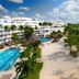 Be Live Experience Hamaca Suites in Boca Chica with beachfront pool, palm trees, and ocean view