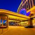 Grand Metropark Guofeng Hotel Tangshan entrance with illuminated canopy and glass facade in Tangshan