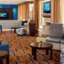 Courtyard by Marriott Jacksonville at the Mayo Clinic Campus/Beaches lobby with seating area and wall TV