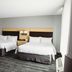 TownePlace Suites by Marriott Aberdeen guest room with two queen beds and window light
