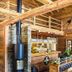 Gut Lauterbad Hotel in Freudenstadt rustic lodge lobby with wood beams and wood stove
