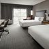 Courtyard by Marriott San Mateo Foster City guest room with two beds and desk