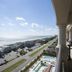 Tilghman Beach And Golf Resort in North Myrtle Beach with ocean view, road, and pool from balcony