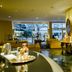 Grand Hotel del Mare Resort & Spa in Bordighera lobby with seating and large windows overlooking outdoors