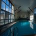 Indoor pool at Widbrook Grange in Bradford-on-Avon with large windows and natural light