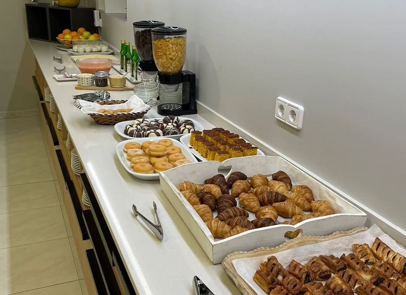 Hotel Bradomin Vilanova de Arousa breakfast buffet with pastries, fruit, cereal and coffee station
