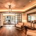 Banyan Tree Puebla lobby with fireplace, seating area and warm wood floors in Puebla City