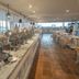 Nims Hotel Seminyak, Kuta: buffet dining area with covered chafing dishes and seating by windows