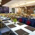ibis Saigon South restaurant in Ho Chi Minh City with modern dining area and bar seating
