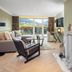Hotel Bareiss in Baiersbronn living room with fireplace, mountain view, and balcony doors