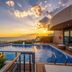 Susesi Luxury Resort, Belek: rooftop pool deck with sea view at sunset