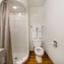 Motel 6 Dayton, OH bathroom with shower, toilet and granite vanity