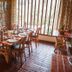 Dining room at Villa Rock Stop Falls Gigiri in Nairobi with set table and large window views