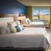 Hotel Indigo Asheville Downtown guest room with two beds and mountain view in Asheville