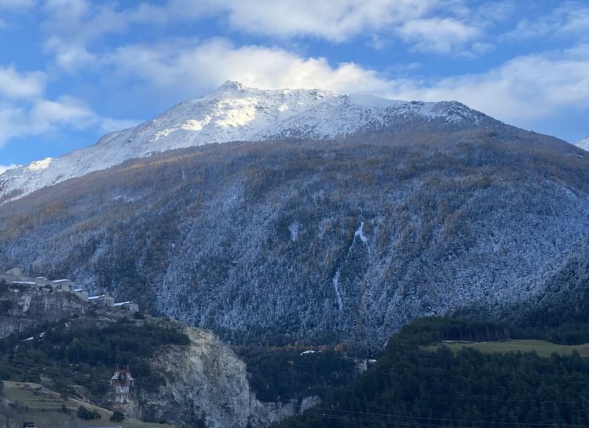 Residence Plein Soleil in Villarodin-Bourget with a snow-capped mountain view and blue sky