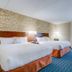 Fairfield Inn by Marriott Portsmouth Seacoast room with two double beds and desk in Portsmouth