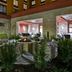 Home2 Suites by Hilton Orlando at FLAMINGO CROSSINGS Town Center courtyard fire pit at night in Bay Lake