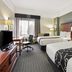 La Quinta Inn & Suites By Wyndham Dfw Airport South Irving room with two beds and desk
