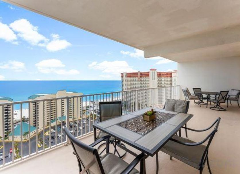 Laketown Wharf 1712 in Panama City Beach balcony with ocean view and outdoor dining area