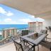 Laketown Wharf 1712 in Panama City Beach balcony with ocean view and outdoor dining area