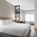 Hyatt Place Atlanta/Alpharetta/North Point Mall guest room with king bed and large window in Alpharetta