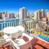 Hotel Servigroup Pueblo Benidorm balcony with table and chairs overlooking Benidorm skyline