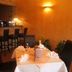 Przylądek Daglezja nad Jeziorem Kórnickim in Kórnik: cozy hotel bar and dining area with set table