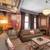 The Giacomo, an Ascend Collection Hotel in Niagara Falls, lounge suite with city views and fireplace