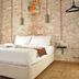 Olea Leya Hotel, Ayvalik: minimalist guest room with double bed and exposed brick wall