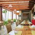 Hideaway at Royalton Punta Cana open-air restaurant with ocean view and red banquette seating in Punta Cana