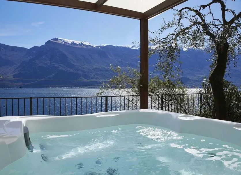 Hotel Atilius Adults Only in Limone sul Garda: lakeview hot tub with mountain backdrop