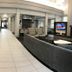 Residence Inn by Marriott Lincoln South lobby with seating area, TV, and front desk in Lincoln