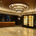 Ramada Encore by Wyndham Jalandhar lobby with circular ceiling lights and reception desk