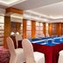 Ramada Encore by Wyndham Jalandhar meeting room with long conference table and white chairs